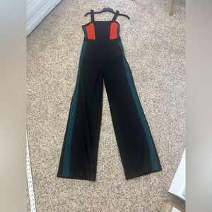 Black, Green and Red Jumpsuit. Stretchy and form fitting. Medium-very forgiving